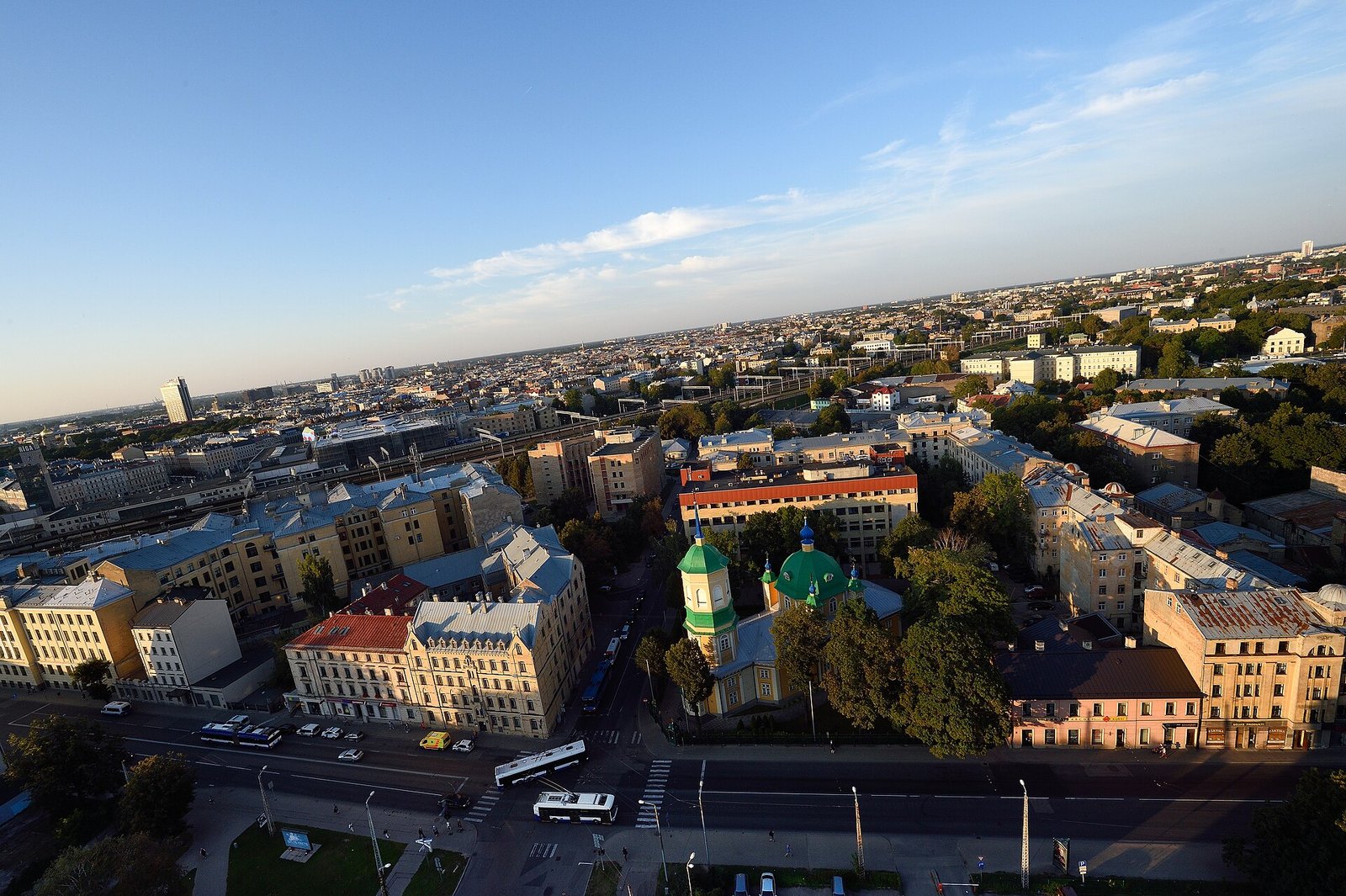 Spires and rooftops of old Riga seen from above in clear light